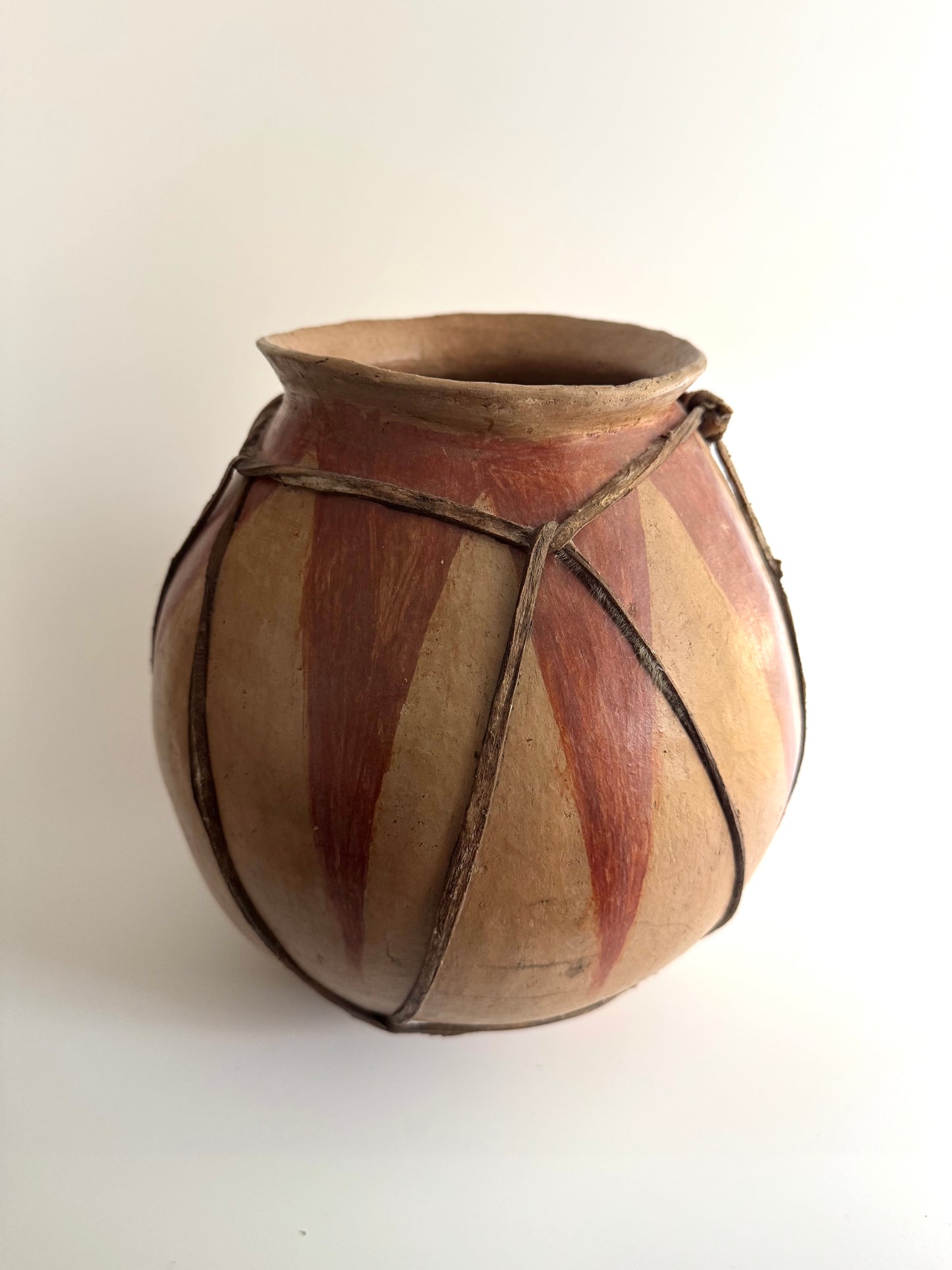 Handmade Tribal Clay Pot with Natural Pigment and Leather Detailing